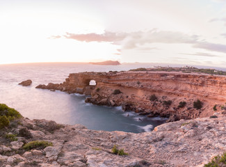 Fototapeta na wymiar Ibiza sunset from Cala Conta Comte in San Jose at Balearic Islands Spain.