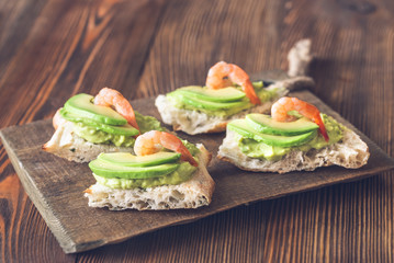 Sandwiches with avocado and shrimps