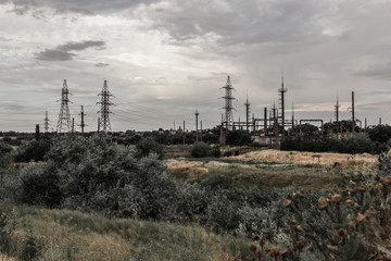 oil refinery at sunset