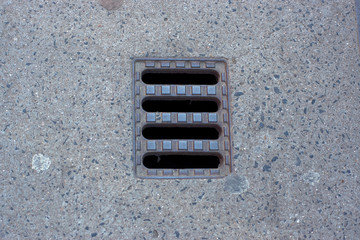 Sidewalk grate in the sidewalks cement, Berlin Germany