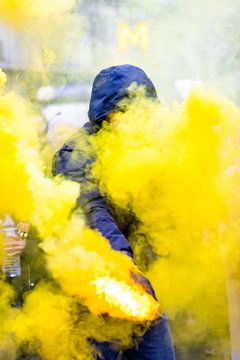 Protester with a torch and yellow smoke - 5/6