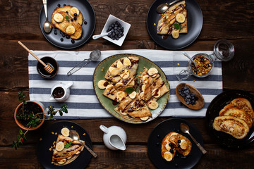 crepes with banana, chocolate-nut sauce and sweet croutons