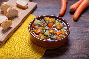 Mixed vegetable soup with bread. Minestrone, winter food, detox food
