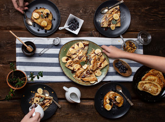 crepes with banana, chocolate-nut sauce and sweet croutons