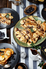 crepes with banana, chocolate-nut sauce and sweet croutons