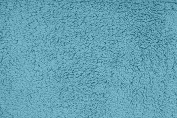 Blue sherpa textured plush fabric material background
