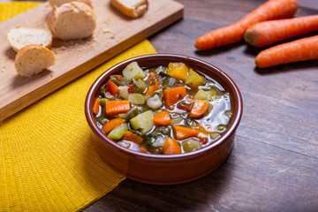 Mixed vegetable soup with bread. Minestrone, winter food, detox food