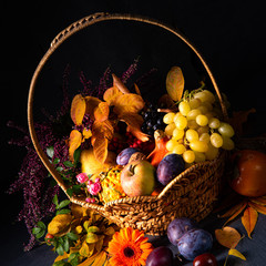 autumnal cornucopia in round basket