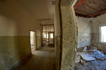 Fototapeta na wymiar hallway Spa building at German ruins of castle Dwasieden abandoned places being retaken by nature