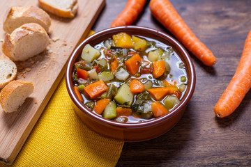 Mixed vegetable soup with bread. Minestrone, winter food, detox food