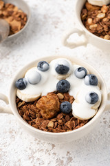 Granola, oatmeal with banana and berry food background