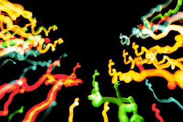 Christmas lights in blurry focus and motion long-exposure photo. Abstract background. Swirl effect. New year, power energy, LED, sci-fi, neon, magic, business or electricity concept photo.