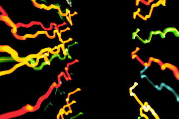 Christmas lights in blurry focus and motion long-exposure photo. Abstract background. Swirl effect. New year, power energy, LED, sci-fi, neon, magic, business or electricity concept photo.