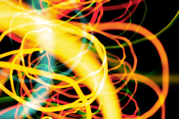 Christmas lights in blurry focus and motion long-exposure photo. Abstract background. Swirl effect. New year, power energy, LED, sci-fi, neon, magic, business or electricity concept photo.