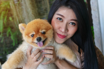 woman hugging love pomeranian dog cute pets