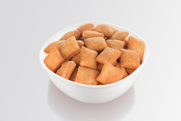 Shakkar pare Also Know as Shakkarpare, Shakarpare, Shakarpali, Shakkar Para, Sakarpara or Shankarpalli or shankar pale is a Snack Typically Made in India During Diwali - Image