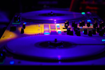 Fototapeta na wymiar DJ vinyl players in dark nightclub, turntables