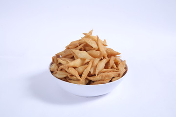 Shakkar pare Also Know as Shakkarpare, Shakarpare, Shakarpali, Shakkar Para, Sakarpara or Shankarpalli or shankar pale is a Snack Typically Made in India During Diwali - Image