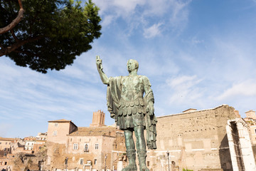 Fototapeta na wymiar statue of Julius Caesar in via dei fori fori in Rome