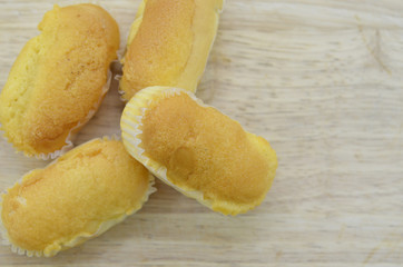 Bread soft on wooden background. Calorie breakfast