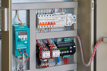 Controller for remote control, circuit breakers, magnetic starters, control relay, power supply, socket, thermostat in the electrical Cabinet. Engine or pump control Cabinet. Assembly, inspection.