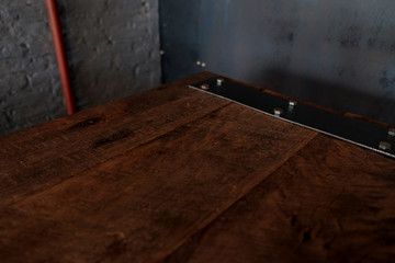 Obraz premium wood table on blur of cafe, coffee shop, bar, resturant, background - can used for display or montage your products