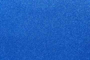 Blue coloured sparkling festive background, close-up. Copy space for text. Horizontal. Celebration,...