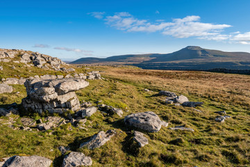 Fototapeta na wymiar The striking erratic boulders resting on the pavements around Ingleborough are some of the most endearing features of the Dales landscape.