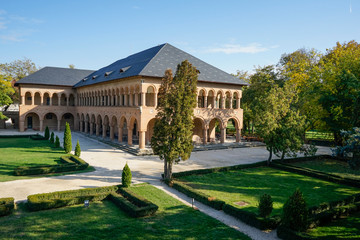 Architectural image with the guesthouse building and the garden in front of it, part of the...