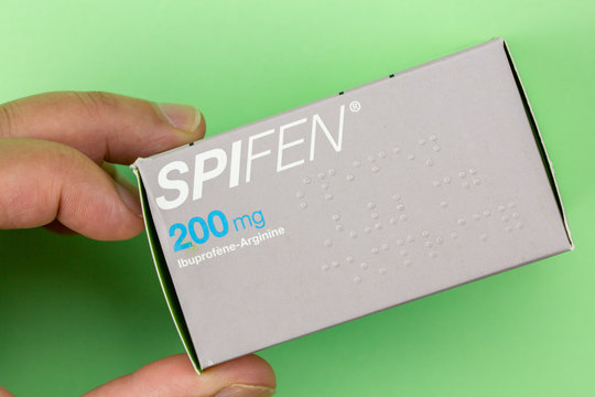Box of spifen 200 mg holding in hand. It is a generic drug whose main molecule is ibuprofen