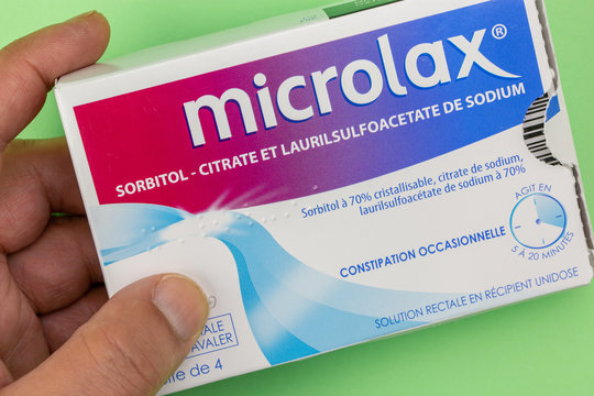 Closeup on Microlax box holding in hand