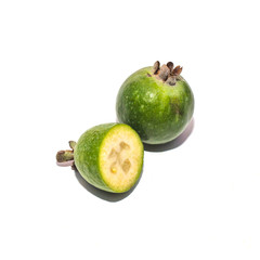 Green feijoa fruit on white background