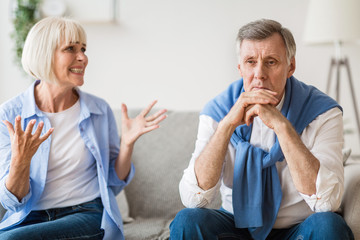 Abusive relationship. Angry woman shouting at husband