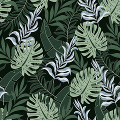 Trend seamless tropical pattern with bright green plants and leaves on dark background.  Beautiful print with hand drawn exotic plants. Summer colorful hawaiian seamless pattern with tropical plants.