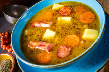 polish pea soup (grochowka) with smoked bacon and sausage