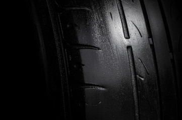 Damage tire on black background with copy space for text or image