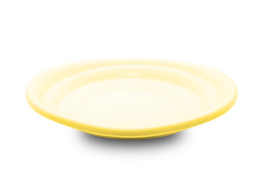 Yellow plate isolated on white background.