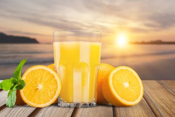 Orange juice and slices of orange on background © BillionPhotos.com