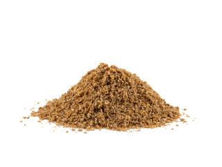 Small pile of a ground coriander isolated on white background with copy space for text or images. Spices and herbs. Packaging concept. Close-up.