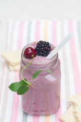 Cherry and blackberry smoothies with whole berries