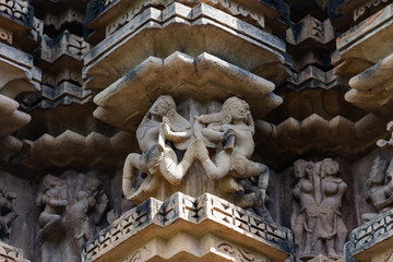 Fototapeta na wymiar Stone carved temple in Khajuraho, Madhya Pradesh, India