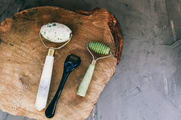 Dermaroller and serum next to an anti aging face cream Beauty industry Close-up Dermaroller for...