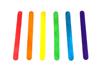 Popsicle sticks rainbow color isolated white background - LGBT pride flag patterns include of Lesbian, gay, bisexual, and transgender flag of LGBT organization.