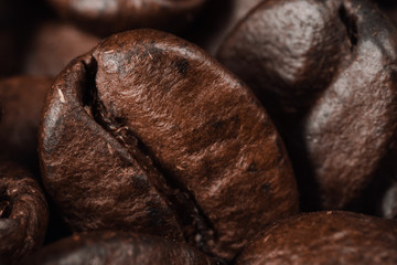 Roasted brown coffee beans. Background and texture.