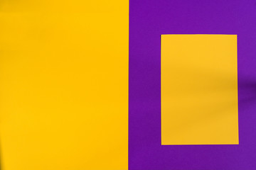 The geometric arrangement of yellow and purple bright paper