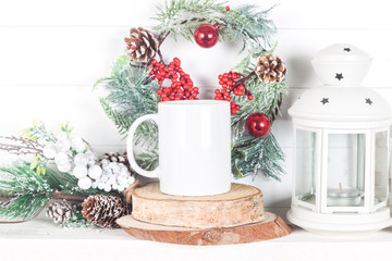 Obraz na płótnie Canvas Christmas mockup of a white mug for display of design