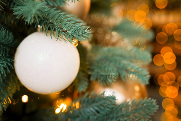 Christmas tree with white ball. Happy New Year theme