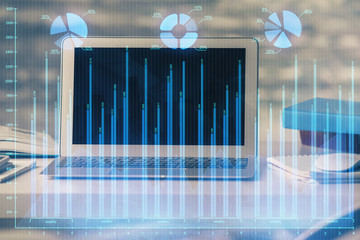 Double exposure of forex graph and work space with computer. Concept of international online trading.