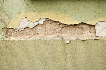 Wandputz beschädigt, Riss in der Wand