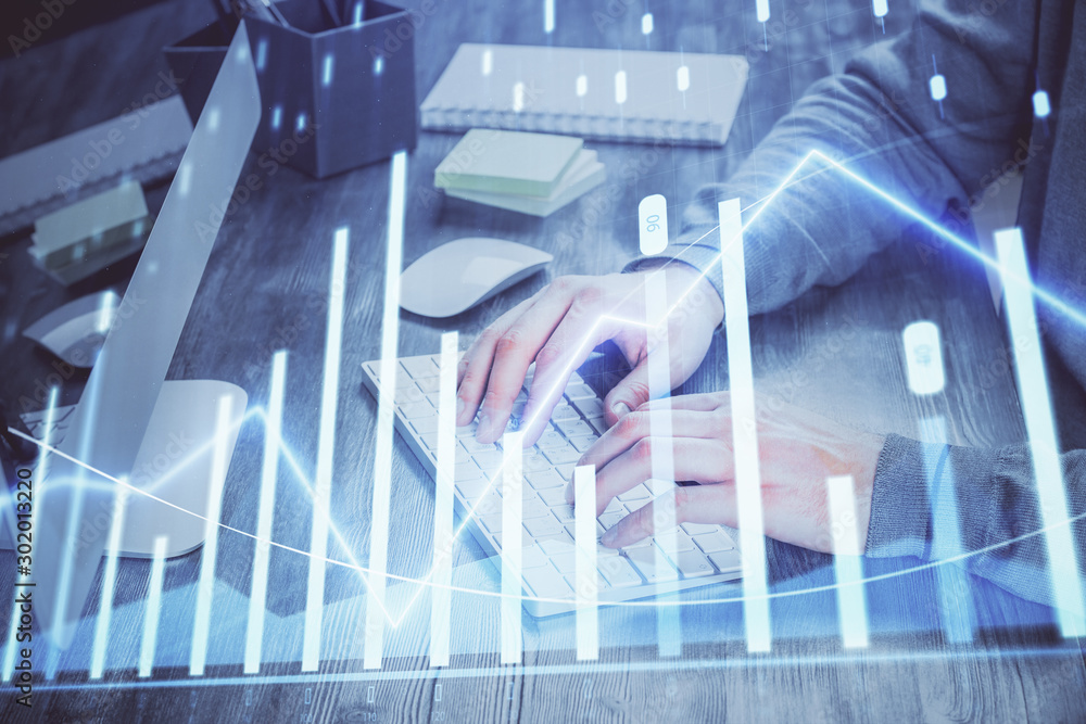 Wall mural double exposure of financial graph with man works in office on background. concept of analysis.